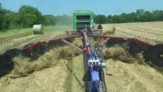 H&s 1460 with balerconnection baling oat hay.