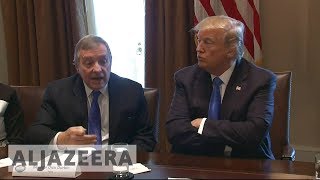 ?? Donald Trump denies derogatory country remarks