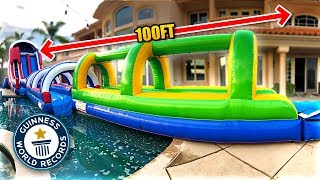 *WORLD RECORD* LONGEST BACKYARD SLIP 'N SLIDE EVER!! (100+ ft)