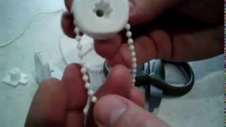 Как вставить цепь в механизм рулонной шторы