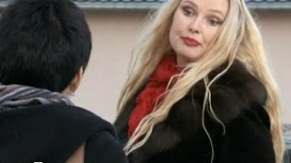 Actress Elena Khlibko in "Do Suda" TV-series. Psychic doing her magic work with alcoholic