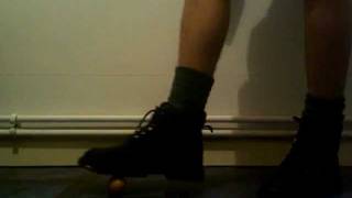 Big Black Boot Crushes Vulnerable Egg