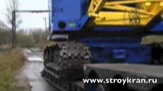 Гусеничный кран МКГ25БР погрузка на трал