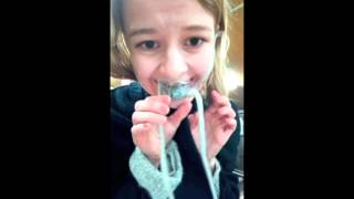 Girl eats whole live octopus
