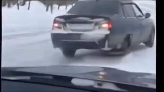 Чувак мочит на нексии!!Прикол!Вместо колеса сани!!!