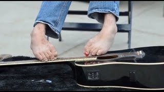 Armless guitarist George Dennehy at Clipper Magazine Stadium