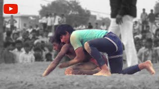 Men vs women :  Traditional indian wrestling , Women pins her male opponent.