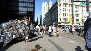DOWNTOWN VANCOUVER BUSKING WITH BAG PIPES... PAN THE PIPER