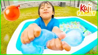Ryan Plays inflatable water toys with Mommy!