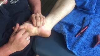 Foot massage and reflexology using tools - Brandon working on Andrew part 3