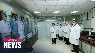 China's death toll from coronavirus surpasses 1,000; Xi makes first visit to hospital