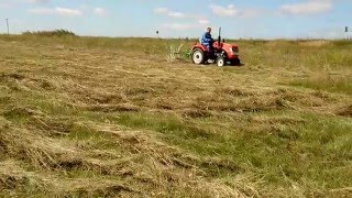 Двухкрылые грабли-ворошилки с минитрактором Уралец