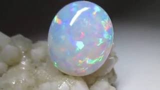 Large Ethiopian opal 18x23 oval 17.55 ct code 8952 Крупный эфиопский опал 18х23 овал 17.55 карата