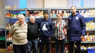 ? FESTIVE SPIRIT! FIRST TEAM HELP AT BATLEY FOODBANK