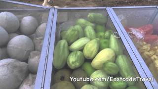 Typical  fresh fruit cart on a Bangkok street