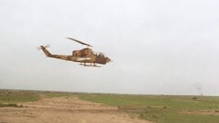 Iranian AH-1 Cobra in action during Iran-Iraq war