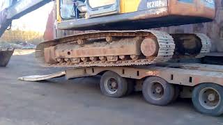 Правильный съезд с трала экскаватор Volvo EC210