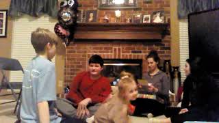Joey nina Alison Tyler Charlotte Reid are opening present Alison's birthday