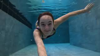 Carla Underwater swimming in a Spa