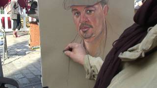 A Pastel portrait demonstration by place du tertre artist Agnes 