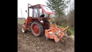 Фрезерование земли с фрезой Kubota на Т-25