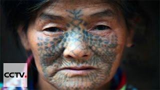 Face-tattooed women on changing ethnic tradition