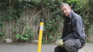 How to install a fold down parking post onto a Tarmac surface.