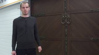 Гаражные секционные ворота:  принципы работы механизмов и их отличия.