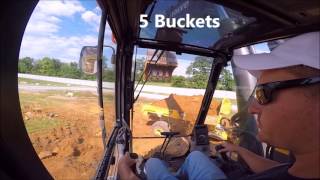 Volvo 750E Excavator Loading Trucks