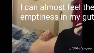Girl teases her loud hungry belly with ice