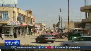 Civilians return to Mosul cautiously but security issues remain