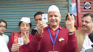 Delhi Elections: DY CM Manish Sisodia casts his vote along with his wife in Pandav Nagar