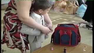 Игра на выпуском утреннике "Собери портфель"