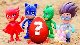 PJ Masks toys - The toy Surprise Egg in the sand.