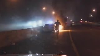 Man trapped in a burning car, but then ...