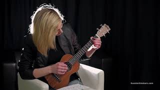 Pretty girl 100 mm Smoking and play the Guitar ?