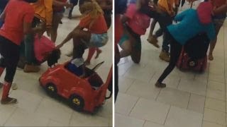 Toddler caught up in middle of Florida mall brawl