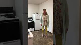 Crossdresser Paulette wearing leggings and sweater outfit...
