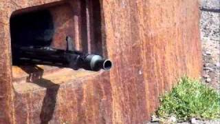 Firing an MG42 from a Nazi bunker in IJmuiden