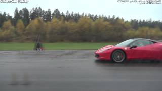 BMW M6 F12 vs Ferrari 458 Italia '12 from 50 km/h in the rain