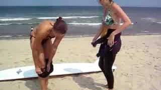 ashley and cyndi take off wetsuits
