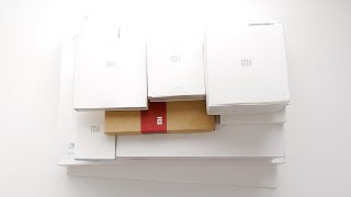 Распаковка аксессуаров от Xiaomi: тонометр, умный дом, тестет воды, роутер MiWIFI3 и др.