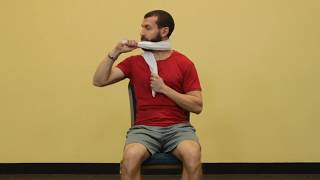 Cervical SNAG with a towel  |  Momentum Physical Therapy of New Paltz