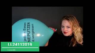 (180) LL24112019 Girl blow to pop big teal balloon inside