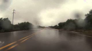 Rain drops on the Reservation, driving over mud covered roads, Indian Route 15, GP040093