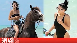 Kendall and Kylie Jenner Horse Around in Swimsuits