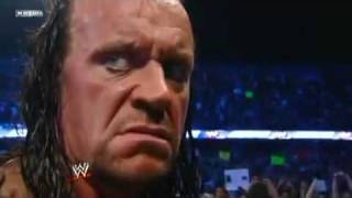 Undertaker Smackdown 9/4/09 Return - Chokeslams CM Punk Through Announce Table