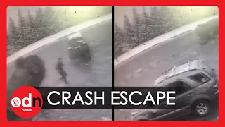 Shocking Moment Pedestrian Almost Crushed by Flying SUV Caught on CCTV