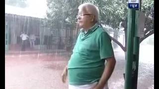 Lalu Prasad Yadav enjoys monsoon outside his Patna home