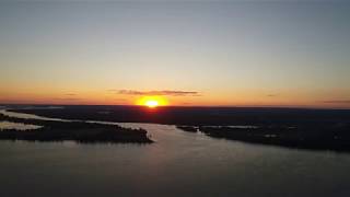 Samara, Embankment of the Volga river, sunset and night city. Shooting with drone